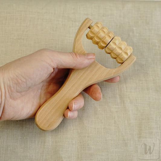 Natural wooden massage roller for wet felting with smooth polished surface and ergonomic design