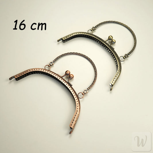 Vintage-style brass metal purse frame with handle, 16cm wide, featuring decorative clasp and pre-punched holes for DIY bag making"