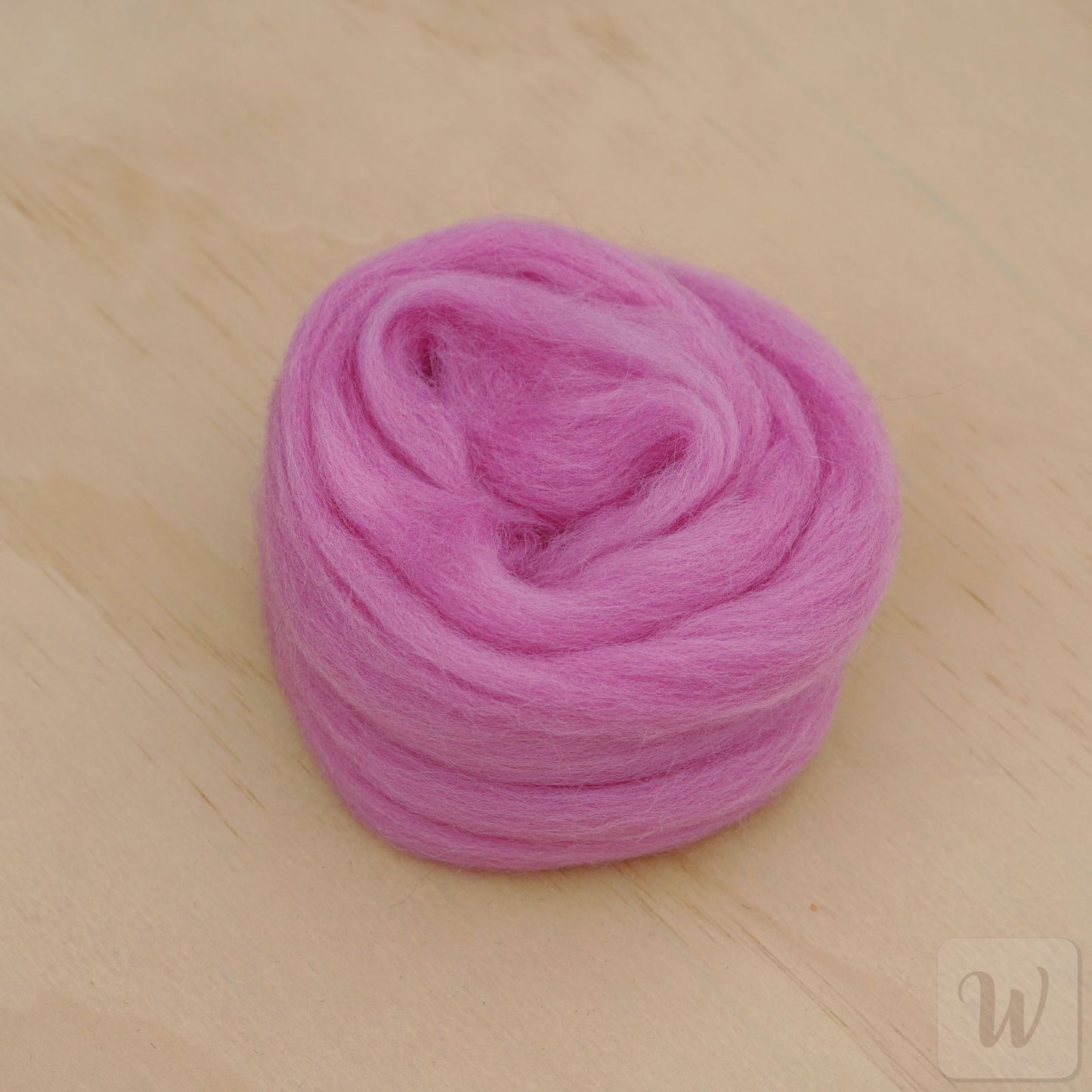 Corriedale wool tops roving in vibrant Cyclamen pink colour, soft smooth fibres for spinning and felting